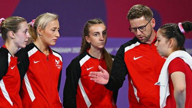 Team Wales talk during the Women's Team Bronze medal match between Team Australia and Team Wales on day four of the Birmingham 2022 Commonwealth Games