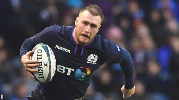 Stuart Hogg runs with the ball against Argentina