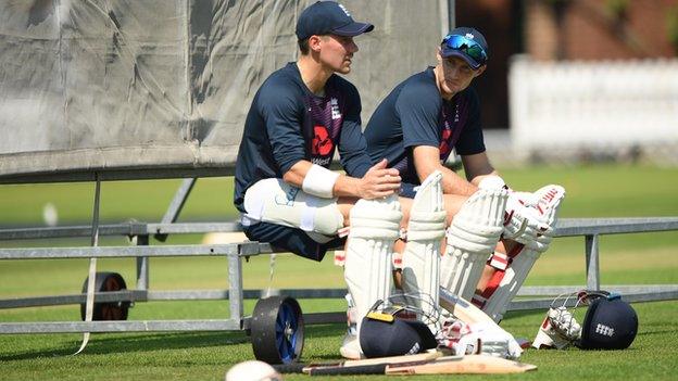 Rory Burns sits with captain Joe Roots during nets at Lord's