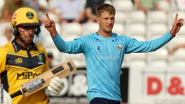 Luc Benkenstein celebrates taking the wicket of James Harris