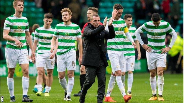 Brendan Rodgers and his Celtic players salute the fans