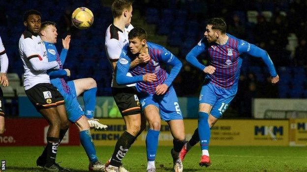 Inverness' Kirk Broadfoot (right) scores to make it 3-3