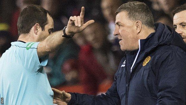 Referee Alan Muir sends Motherwell manager Mark McGhee to the stand at Pittodrie