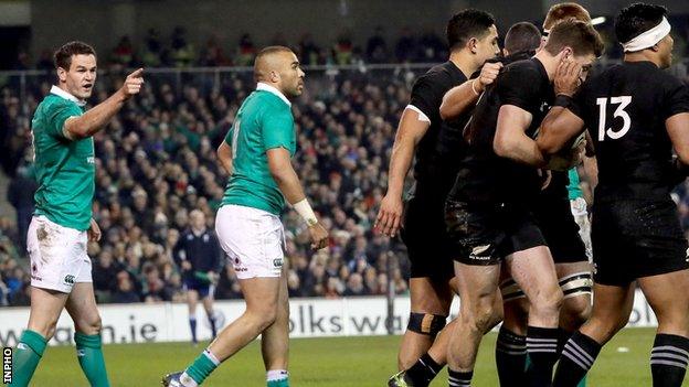 Johnny Sexton makes his feeling clear after Beauden Barrett scores a try for New Zealand in Dublin