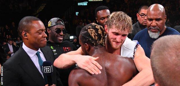 KSI and Logan Paul embrace