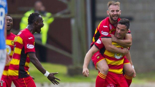 Thistle celebrate Gary Miller's opening goal