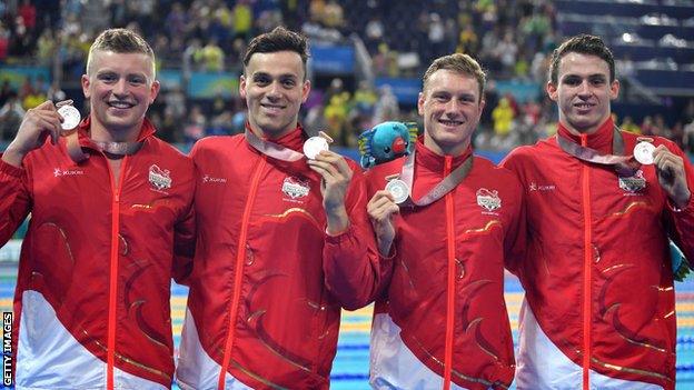 Adam Peaty, James Guy, Luke Greenbank and Benjamin Proud with silver medals at the 2018 Commonwealth Games