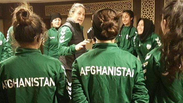 Kelly Lindsey with Afghanistan players