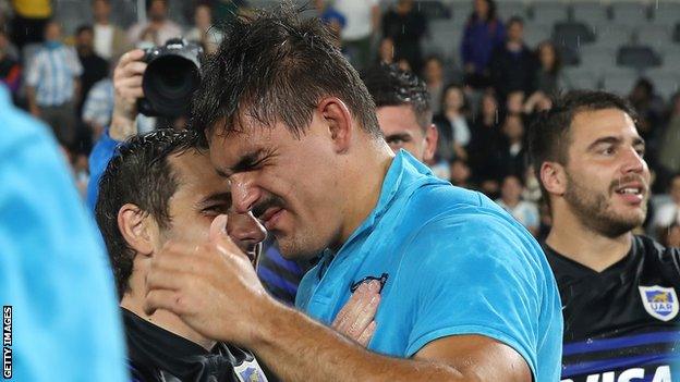 Argentina captain Pablo Matera with his team-mates after the match