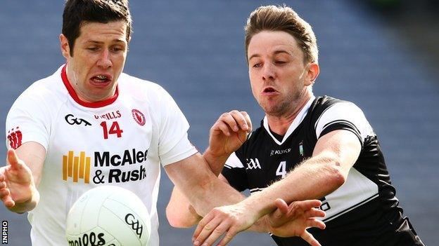 Tyrone's Sean Cavanagh battles with Sligo's Daniel Maye at Croke Park