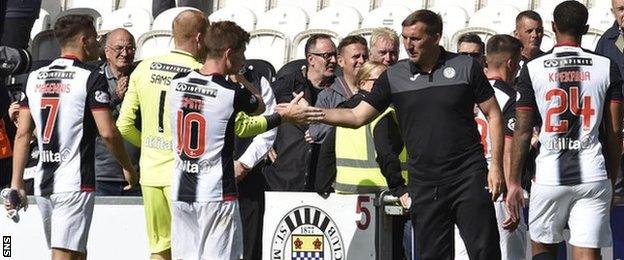 Alan Stubbs celebrating a 6-0 League Cup group win over Dumbarton with players