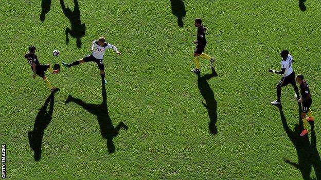 Manchester City's Jesus Navas is closed down in midfield