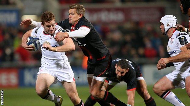 Paddy Jackson makes a break for Ulster as Toby Flood attempts to halt his progress at Kingspan Stadium