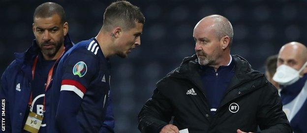 Lyndon Dykes gets guidance from Scotland boss Steve Clarke