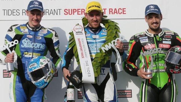 Dean Harrison, Lee Johnston and James Hiller take to the podium following the Supersport opener