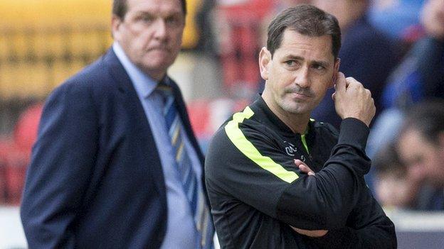 Jackie McNamara looks concerned on the Dundee United touchline