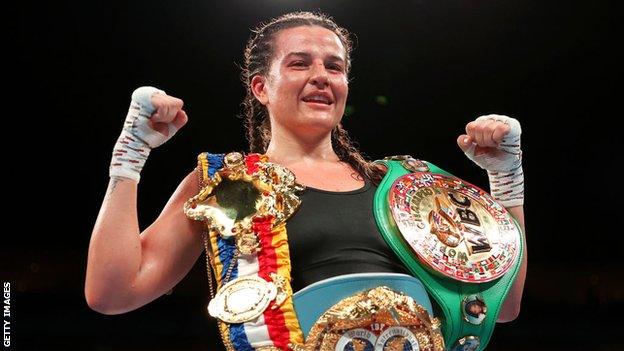 Chantelle Cameron poses with her belts