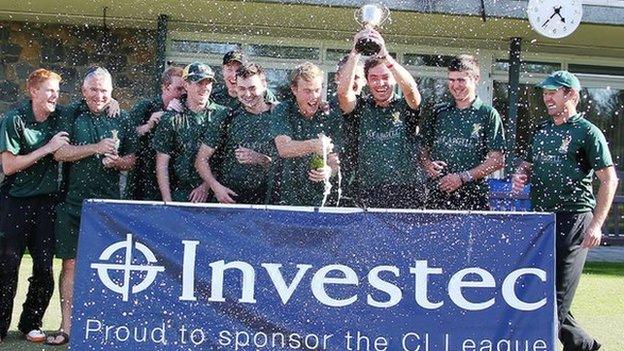 Argyll Investment celebrate winning the title