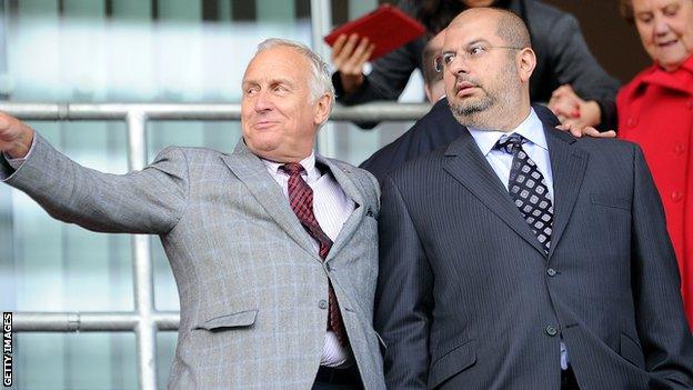 Prince Abdullah Bin Mosaad Abdulaziz Al Saud and co-owner Kevin McCabe watch Sheffield United play Rotherham in September 2013