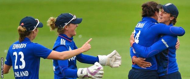 England celebrate a catch by Jenny Gunn (far right)