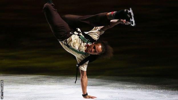 Elladj Balde performing at the 2014 World Figure Skating Championships