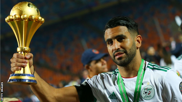 Algeria forward Riyad Mahrez with the Africa Cup of Nations trophy