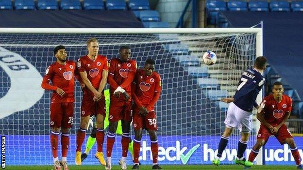 Millwall top scorer Jed Wallace's fifth goal of the season put the Lions ahead against Reading at The Den