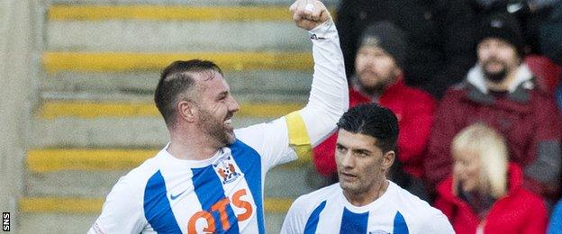 Kris Boyd (left) celebrates after scoring