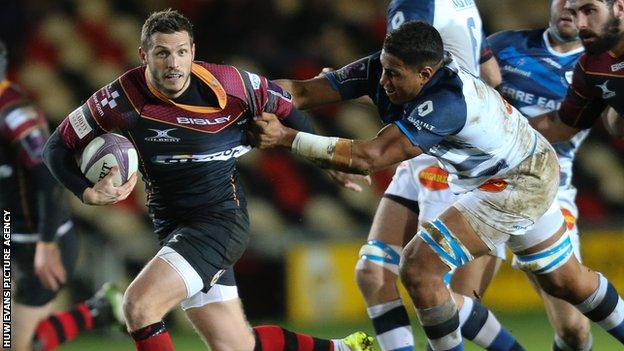 Jason Tovey is tackled by Mathieu Babillot of Castres