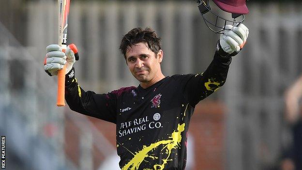 Somerset batsman Johann Myburgh celebrates scoring a century