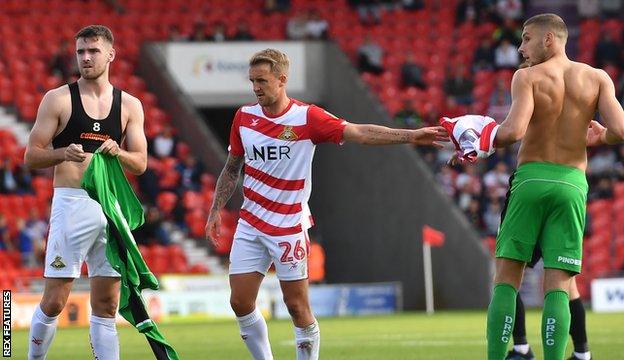 Ben Whiteman (left) prepares to go in goal for Doncaster