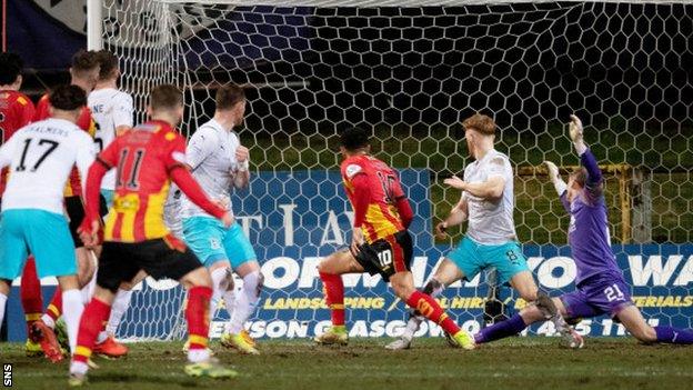 Partick Thistle's Kevin Holt scores