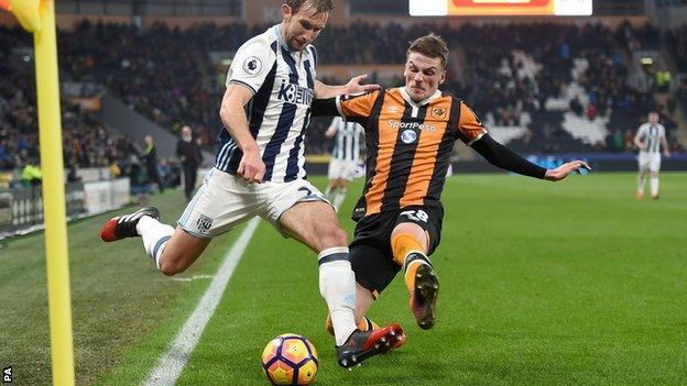 West Bromwich Albion"s Craig Dawson (left) and Hull City"s Josh Tymon (right) battle for the ball