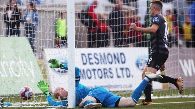 Derry goalkeeper Gerard Doherty was unable to deal with Robbie Benson's deflected strike