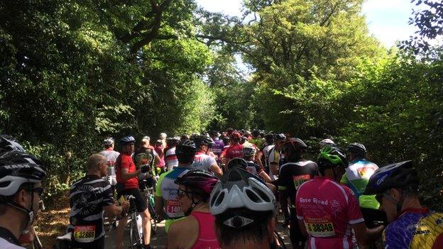 Cyclists waiting for ambulance to arrive