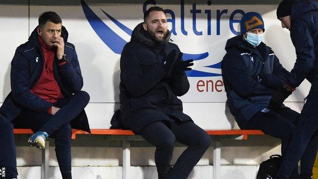 Dundee manager James McPake (centre) said it was "atrocious" the SPFL made his Covid-hit side face Aberdeen on Sunday