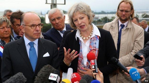 Theresa May and French Interior Minister Bernard Cazenueve