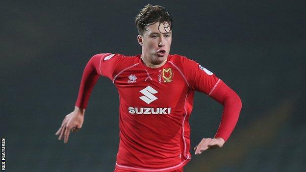 Jack Hendry played 12 games on loan at MK Dons last season