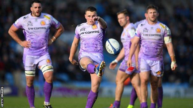 Joe Simmonds kicks the ball