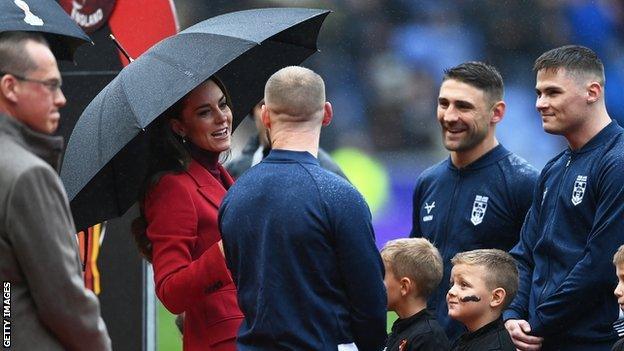 The Princess of Wales talks to England rugby league players