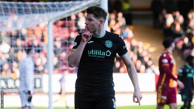 Kevin Nisbet celebrates his hat-trick at Fir Park