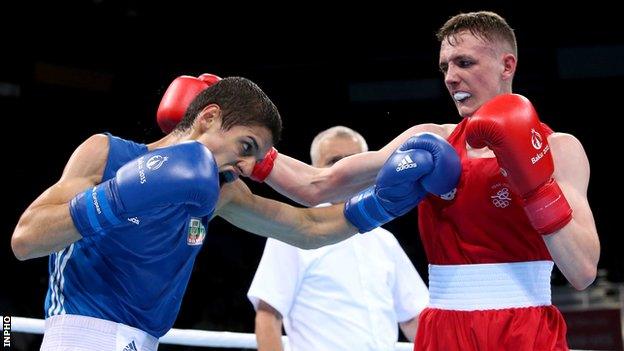 Brendan Irvine in action against Tino Banabakov