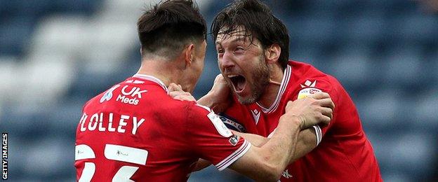 Nottingham Forest players Joe Lolley and Harry Arter celebrate a goal against Blackburn