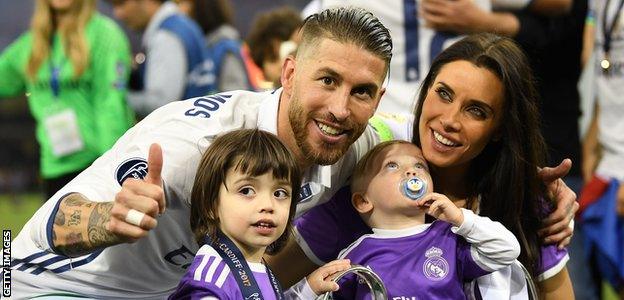 Sergio Ramos with his wife - Spanish TV star Pilar Rubio - and two of his children after the 2017 Champions League final