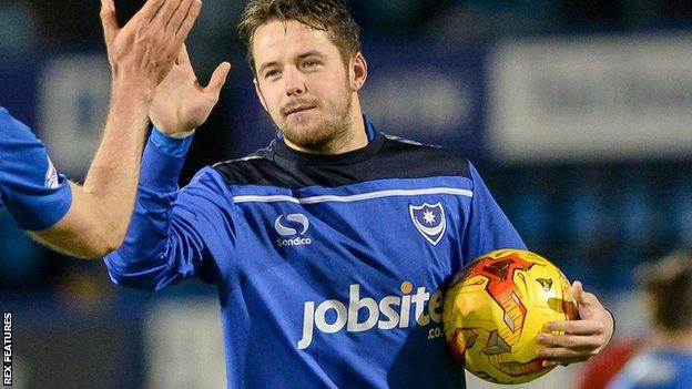 Marc McNulty receives the match ball for his hat-trick against York