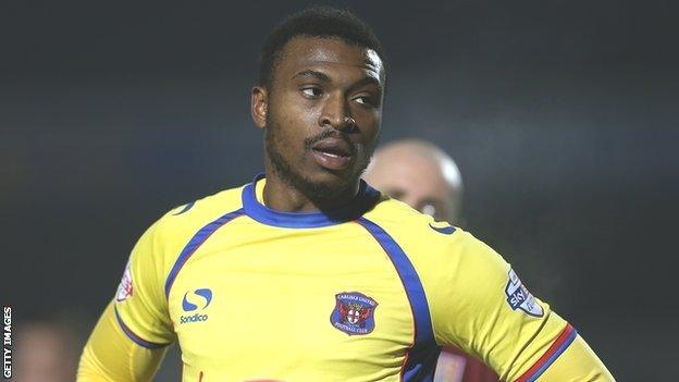 David Amoo in action for Carlisle United