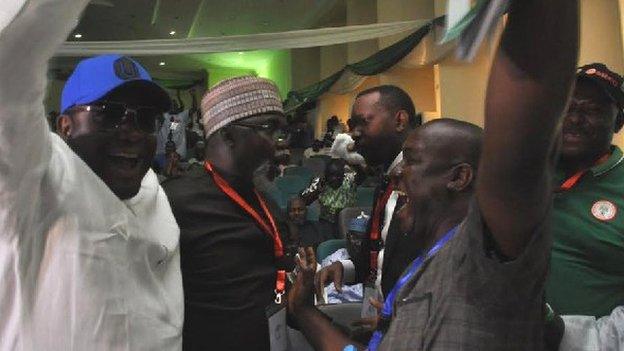 Amaju Pinnick (centre) celebrates winning second term as president of the Nigeria Football Federation