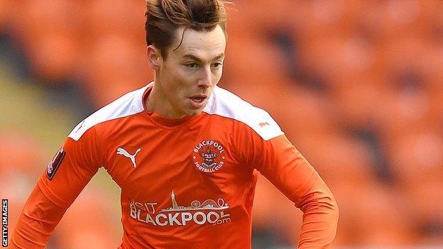 Dan Kemp in action for Blackpool