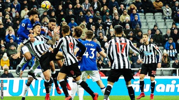 Ashley Williams wins a header