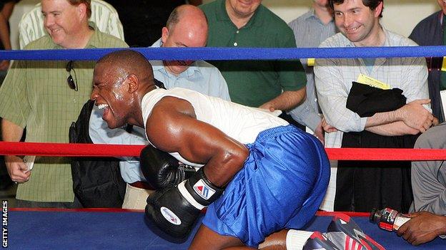 Mayweather entertained reporters by impersonating his opponent struggling after taking a body shot